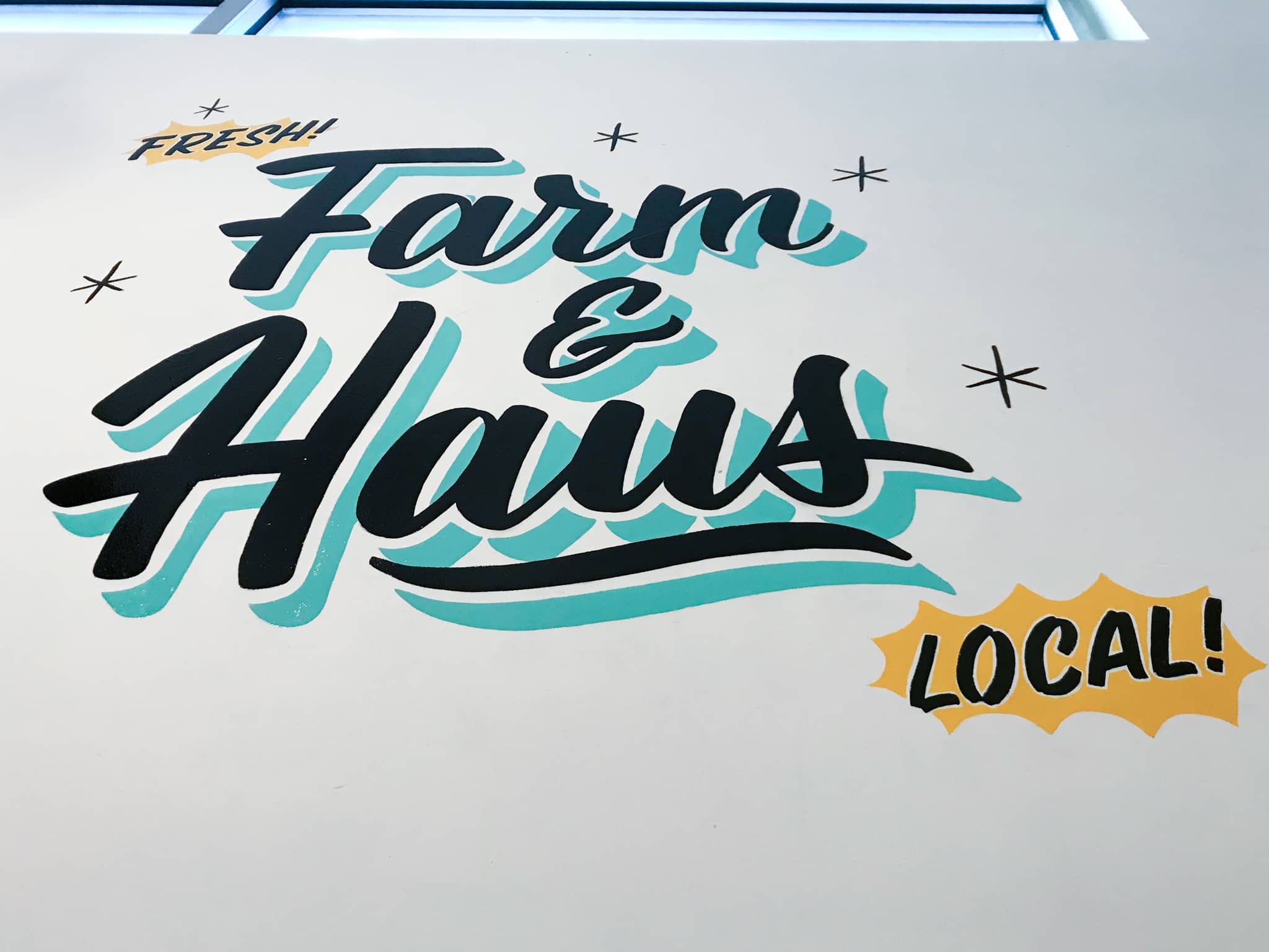 Farm & Haus hand lettered sign painted mural at East End Market by Hillery Powers